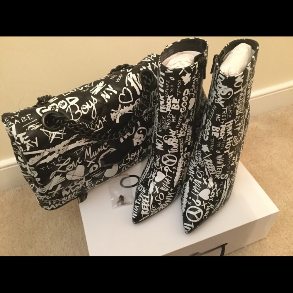 Black and white graffiti ankle booties with purse
